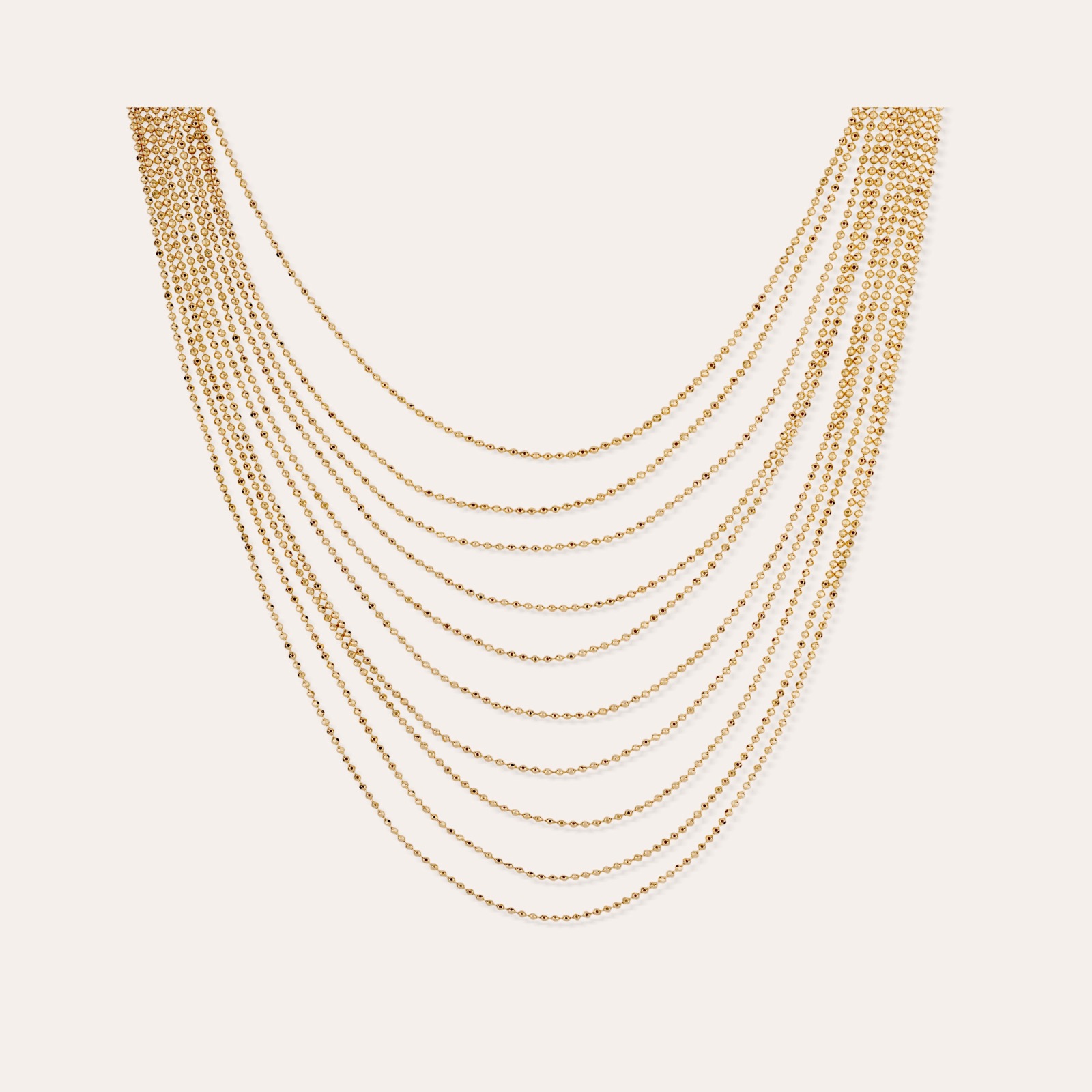 Collier plastron Roméo de Gas Bijoux, superposition de chaînes boules dorées à l'or fin