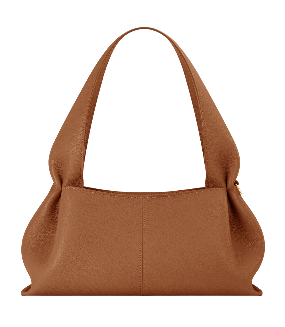 Sac Numéro Neuf East-West de Polène en cuir grainé camel, porté épaule, fermeture zippée