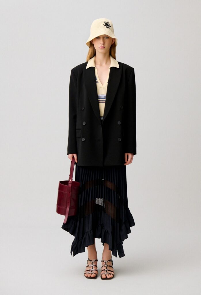 Jupe midi plissée bleu marine à ourlet asymétrique et empiècements en dentelle transparente, Claudie Pierlot