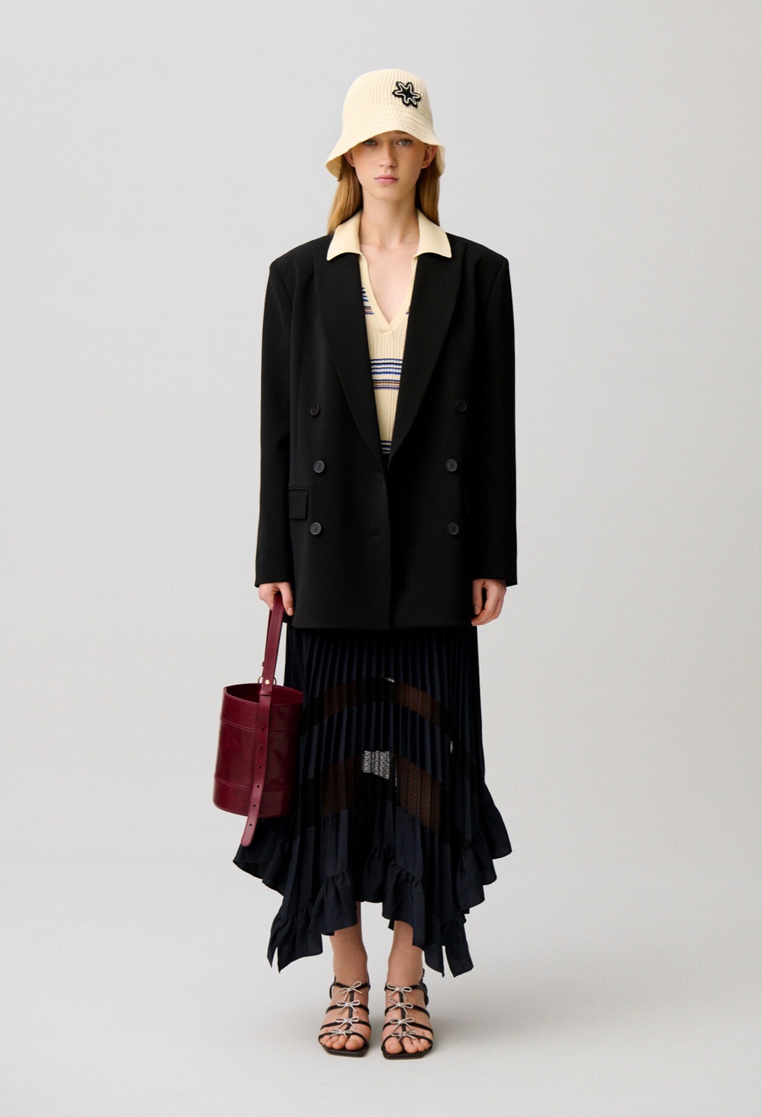 Jupe midi plissée bleu marine à ourlet asymétrique et empiècements en dentelle transparente, Claudie Pierlot