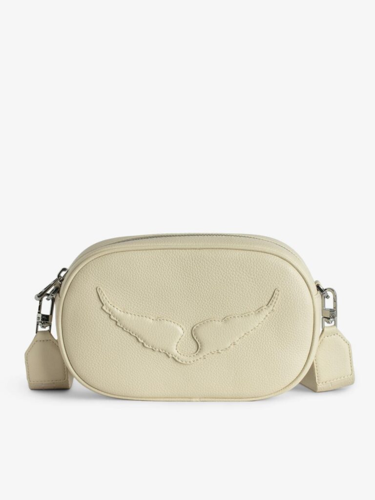 Sac Rock With You de Zadig&Voltaire en cuir grainé écru, format camera bag avec ailes embossées et bandoulière