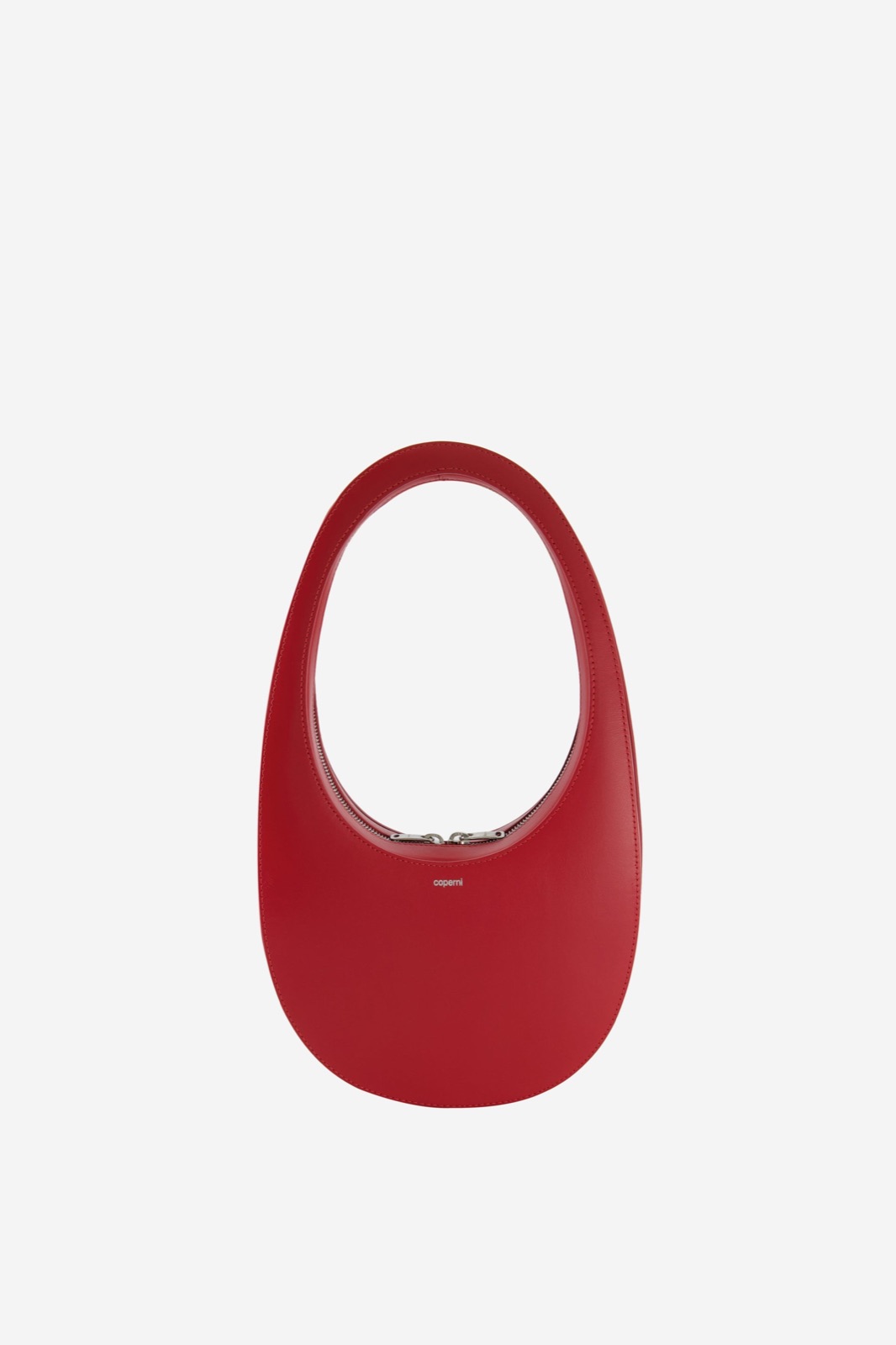Sac Swipe Bag de Coperni en cuir rouge, forme ovale galbée avec anse portée épaule