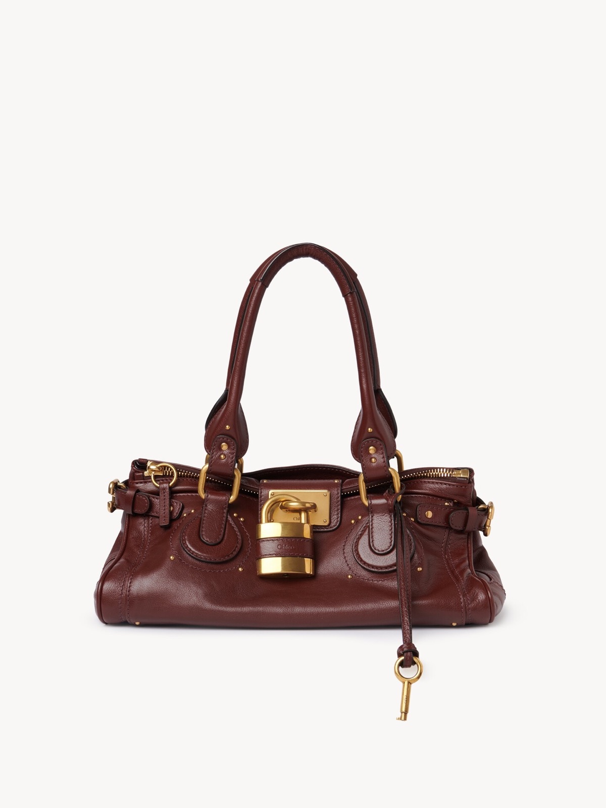 Sac Paddington de Chloé en cuir de buffle grainé brun acajou avec cadenas doré et clé