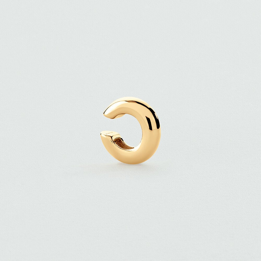 Earcuff Rivoli d'Agatha, gros jonc lisse en laiton doré qui se pince sur le cartilage