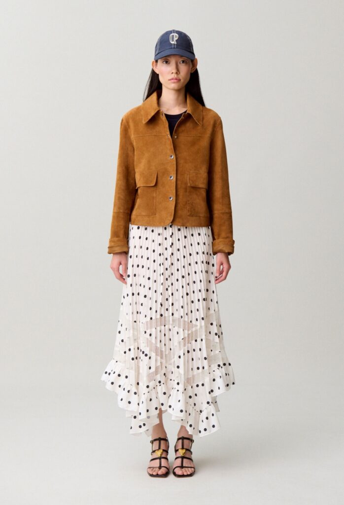 Jupe midi plissée à pois noirs sur fond crème avec empiècements de dentelle ajourée et volants, Claudie Pierlot