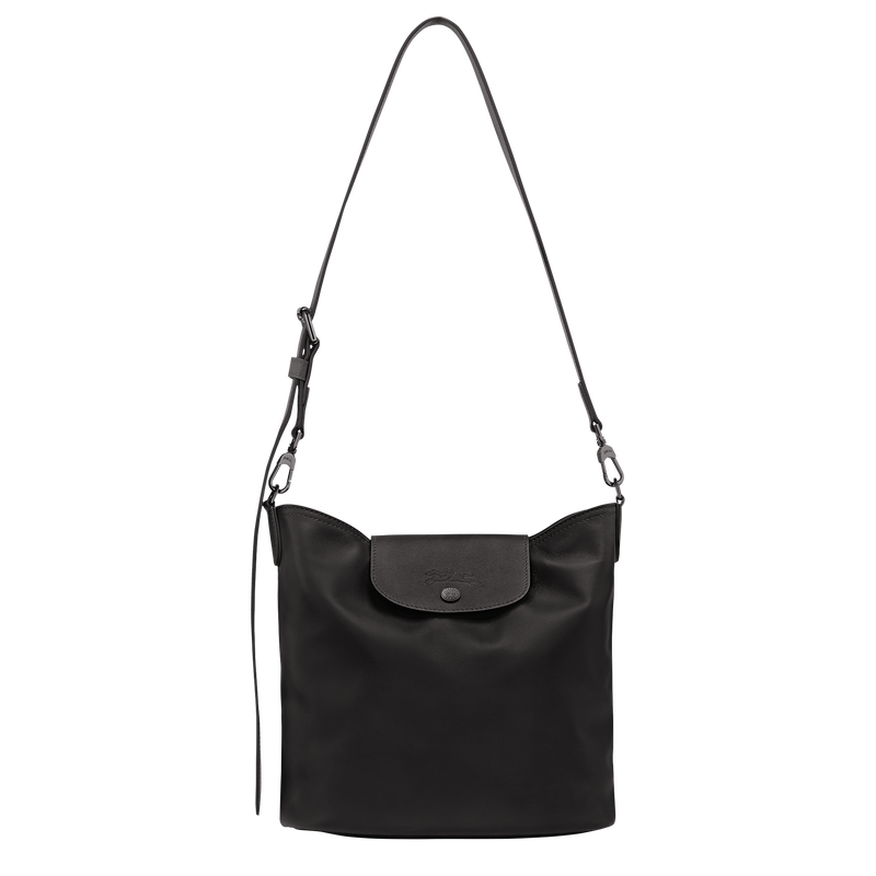 Sac Le Pliage Xtra M en cuir noir de Longchamp, porté épaule avec bandoulière réglable et rabat à bouton pression