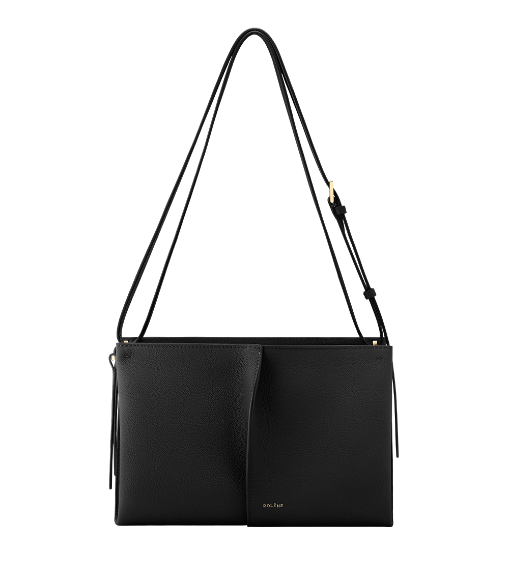 Sac Boky de Polène en cuir grainé noir, porté bandoulière, avec pli torsadé central